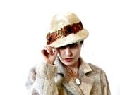 melusine. vintage 30s cloche style creamy fur hat with beautiful feather band.