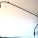 Black with brass "potence" style lamp 48"