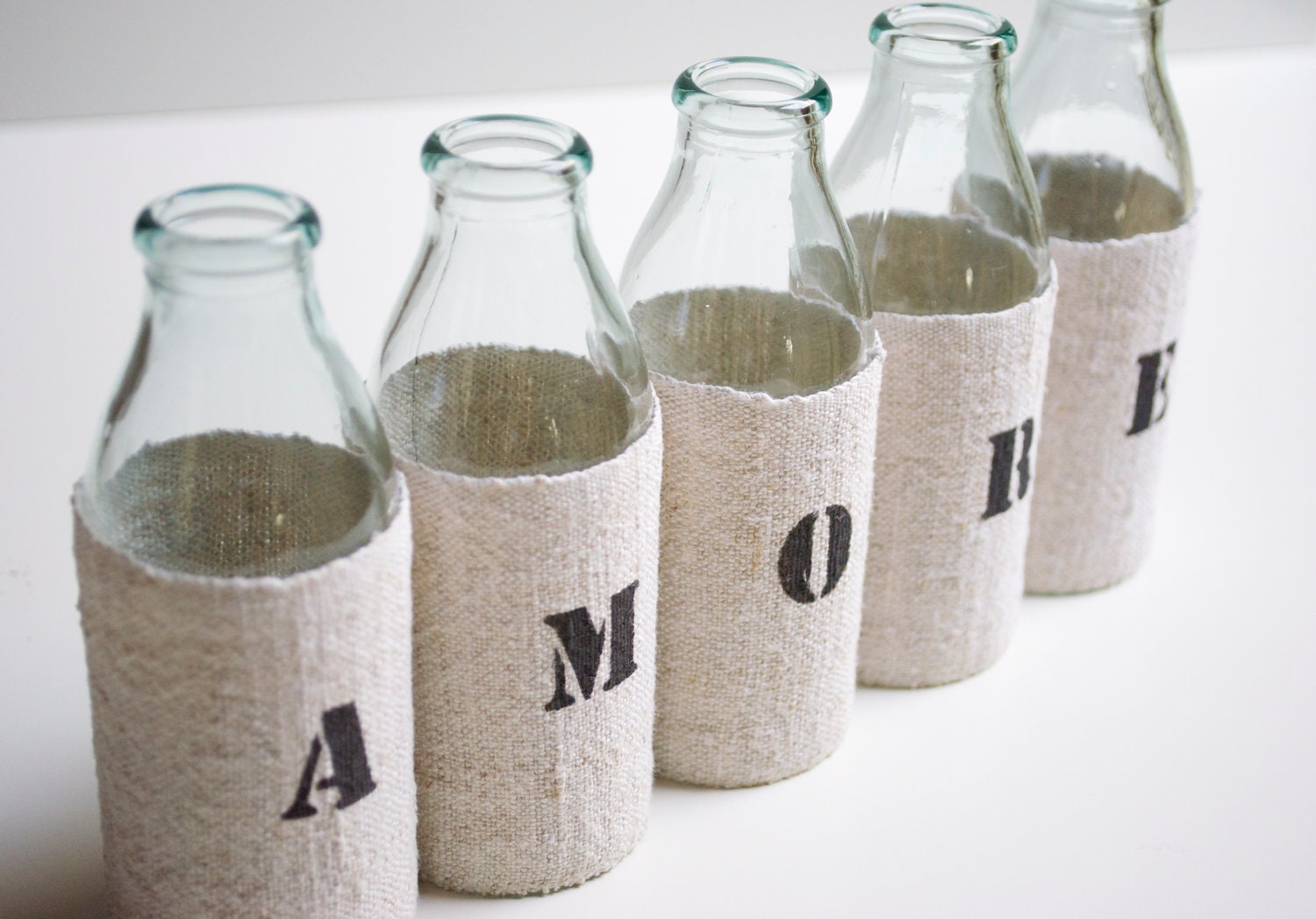 AMORE vase -  from 5 small recycled glass bottles and a grain sack cover