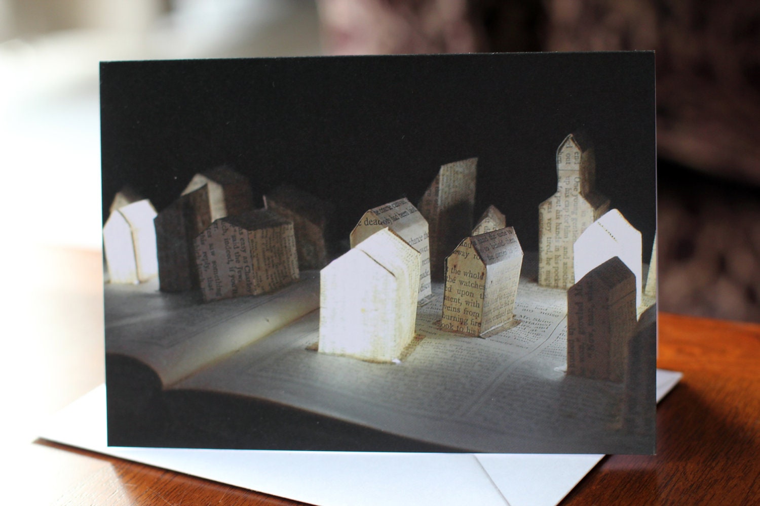 Midwinter Village Christmas card of an altered book sculpture