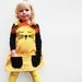 girls gold lion dress , 6m.1y,2y,3y,4y,5y,6y by wild things,