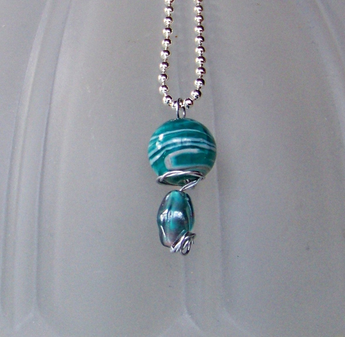 Wire Wrapped Bead Pendant with chain in turquoise or aqua with white swirls and iridescent lower bead