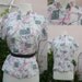 novelty print 50s atomic print cap sleeve blouse with mandarin collar