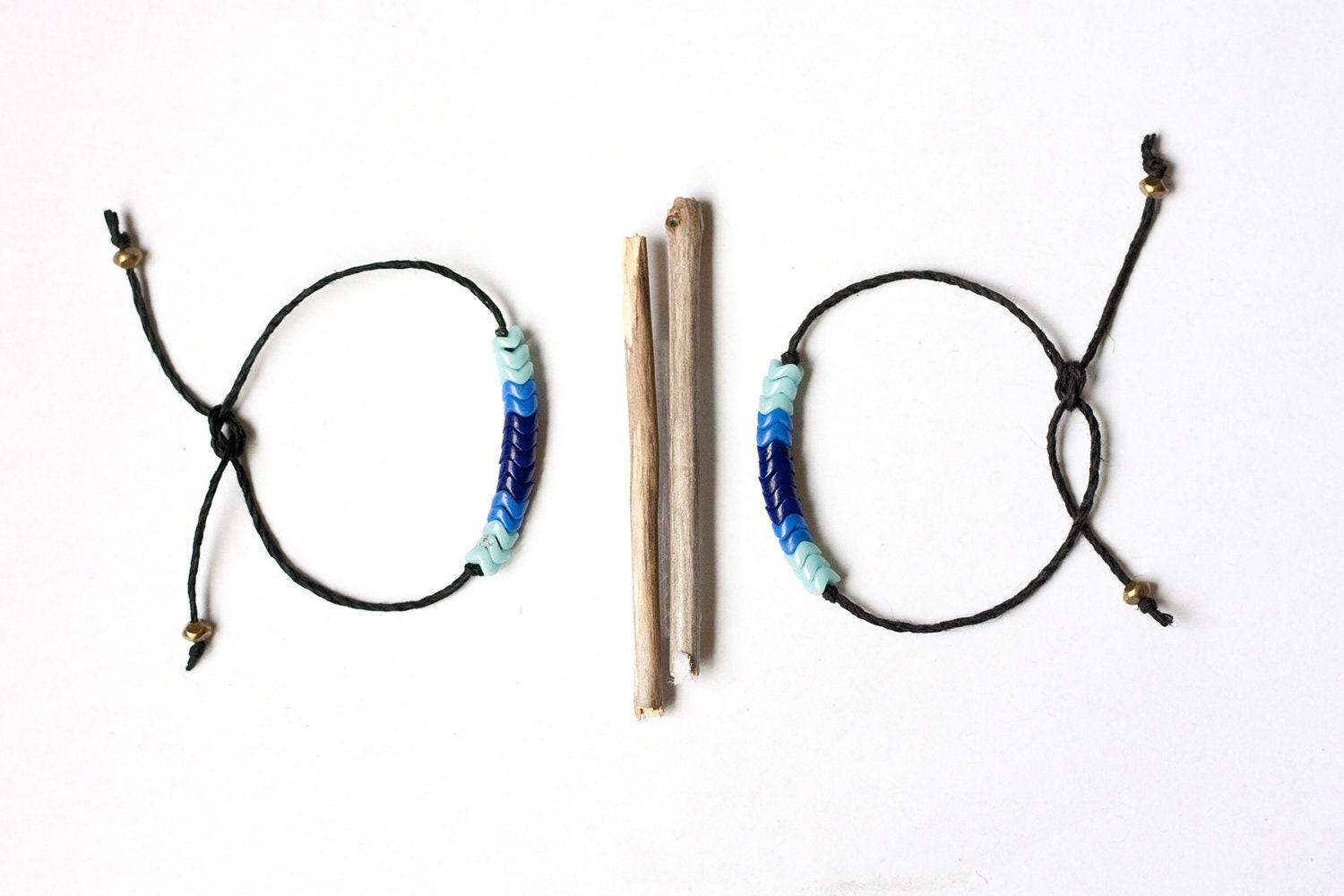 SALE, TWO friendship beaded bracelets, czech beads, pale blue, medium blue, navy, black rope, brass beads