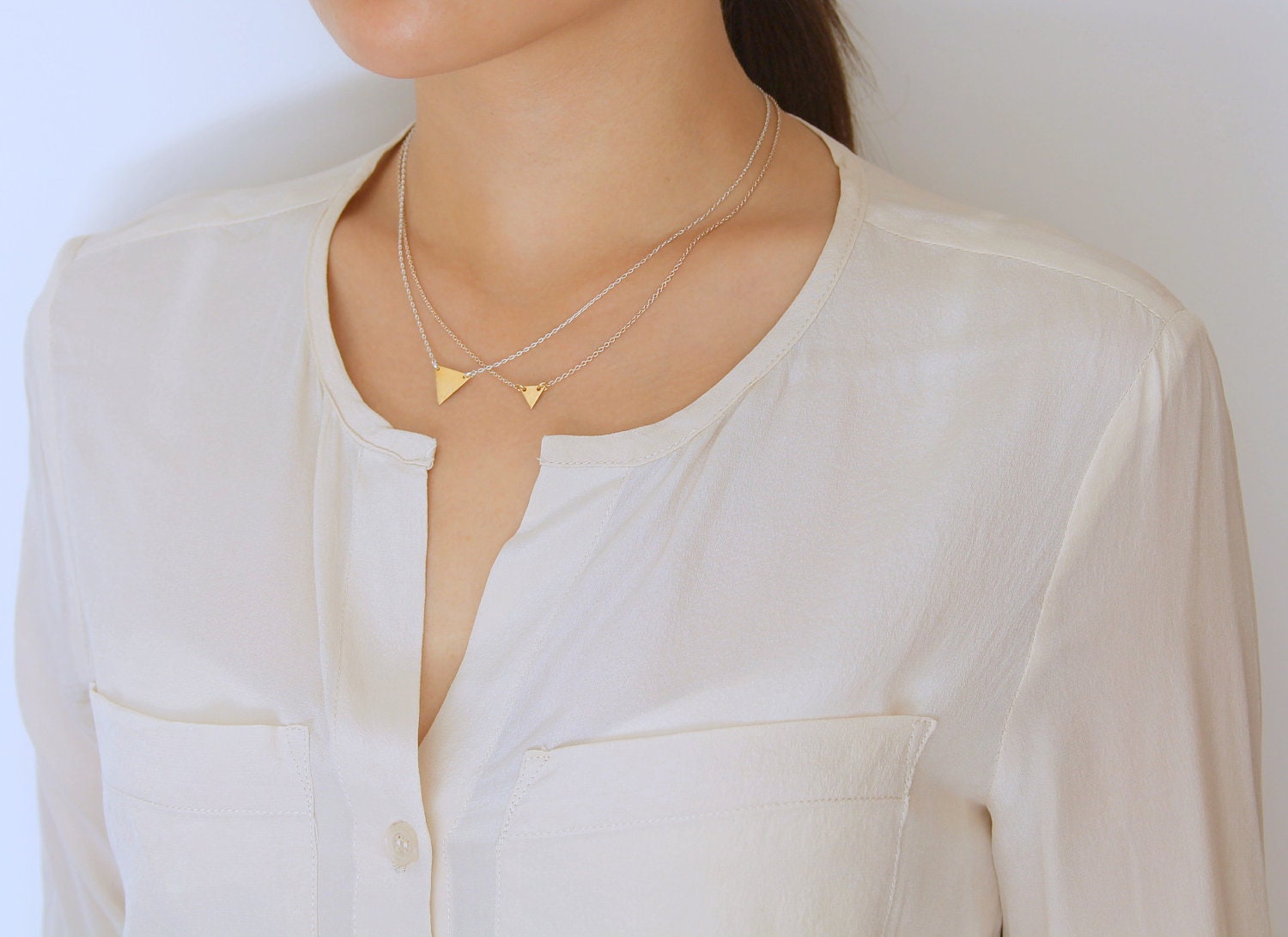 Delicate simple everyday triangle blank pendant necklace chain available in gold or silver