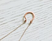 Delicate simple everyday hand forged horseshoe necklace