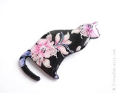 Black cat brooch with pink flower