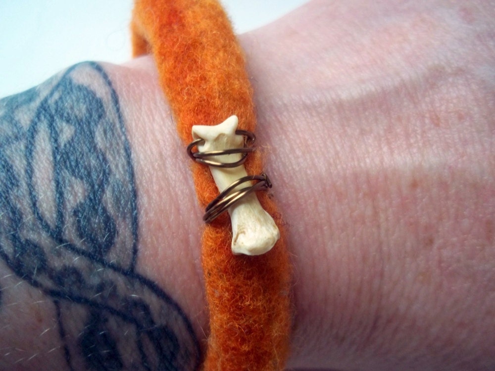 Coyote bone bracelet -  pumpkin orange felt with button clasp - shamanic totem jewelry - wicca - unisex - jewelry for men