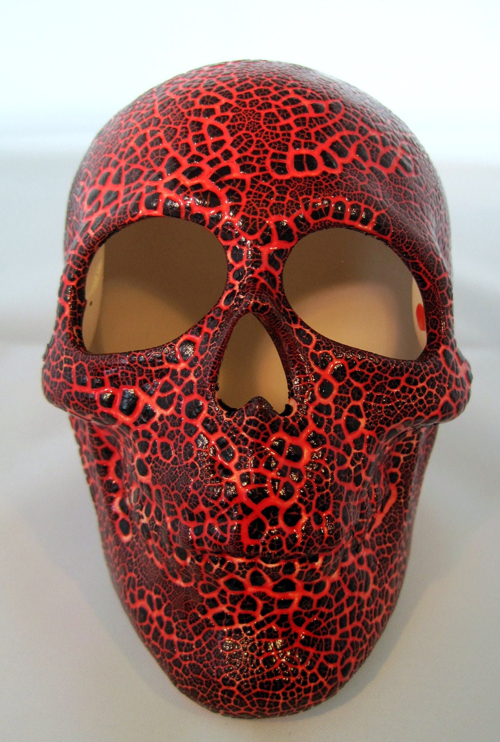 Ceramic Skull -- Red Skull with Embossed Black Cobblestone Glaze on top