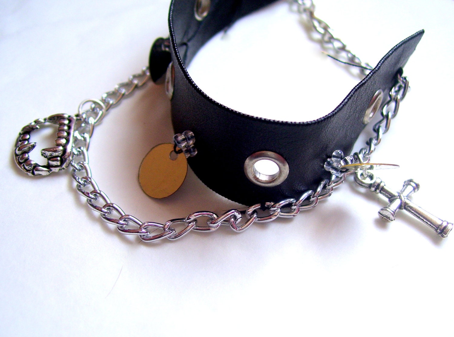 Black punk, gothic cuff, bracelet with vampire fangs and cross.