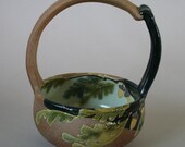 handmade stoneware basket with oak leaf motif and acorns for home decor in a Craftsman style