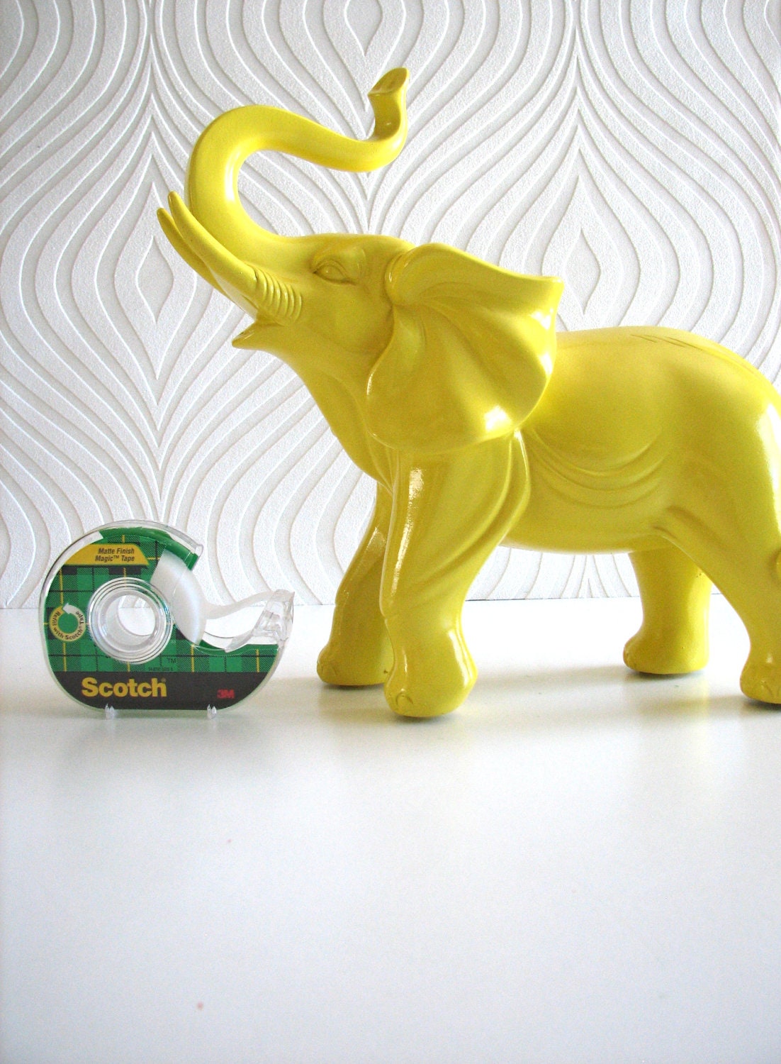 Ollie the fun glossy yellow elephant