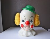 Creepy Cute Retro Vintage Chalkware Clown Bank with Yellow Yarn Hair and Bright Green Hat