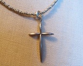 Necklace with Antique Silver Cross Charm Strung on Antique African Metal Beads