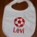 Personalized baby bib with appliqued soccer ball