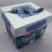 Blue mini handwoven paper basket crafted from upcycled paper