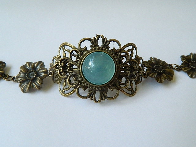 Antique brass bracelet blue moon