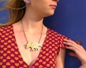 Triceratops Necklace. Laser Cut Acrylic Dinosaur Necklace. Mirrored Perspex and Cherry Wood.