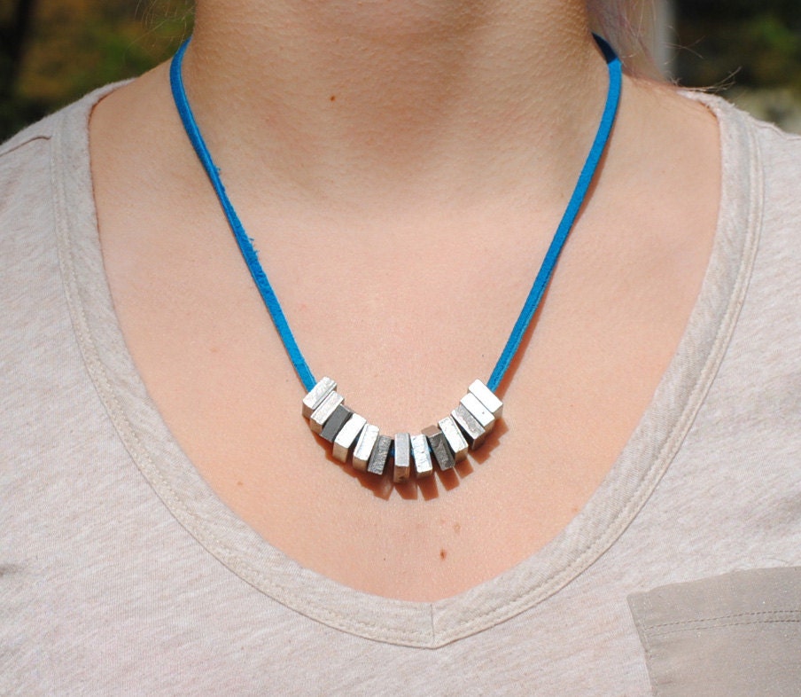 Square nut and leather necklace