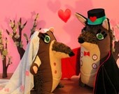 Wedding postcard, hedgehog and bat are in love