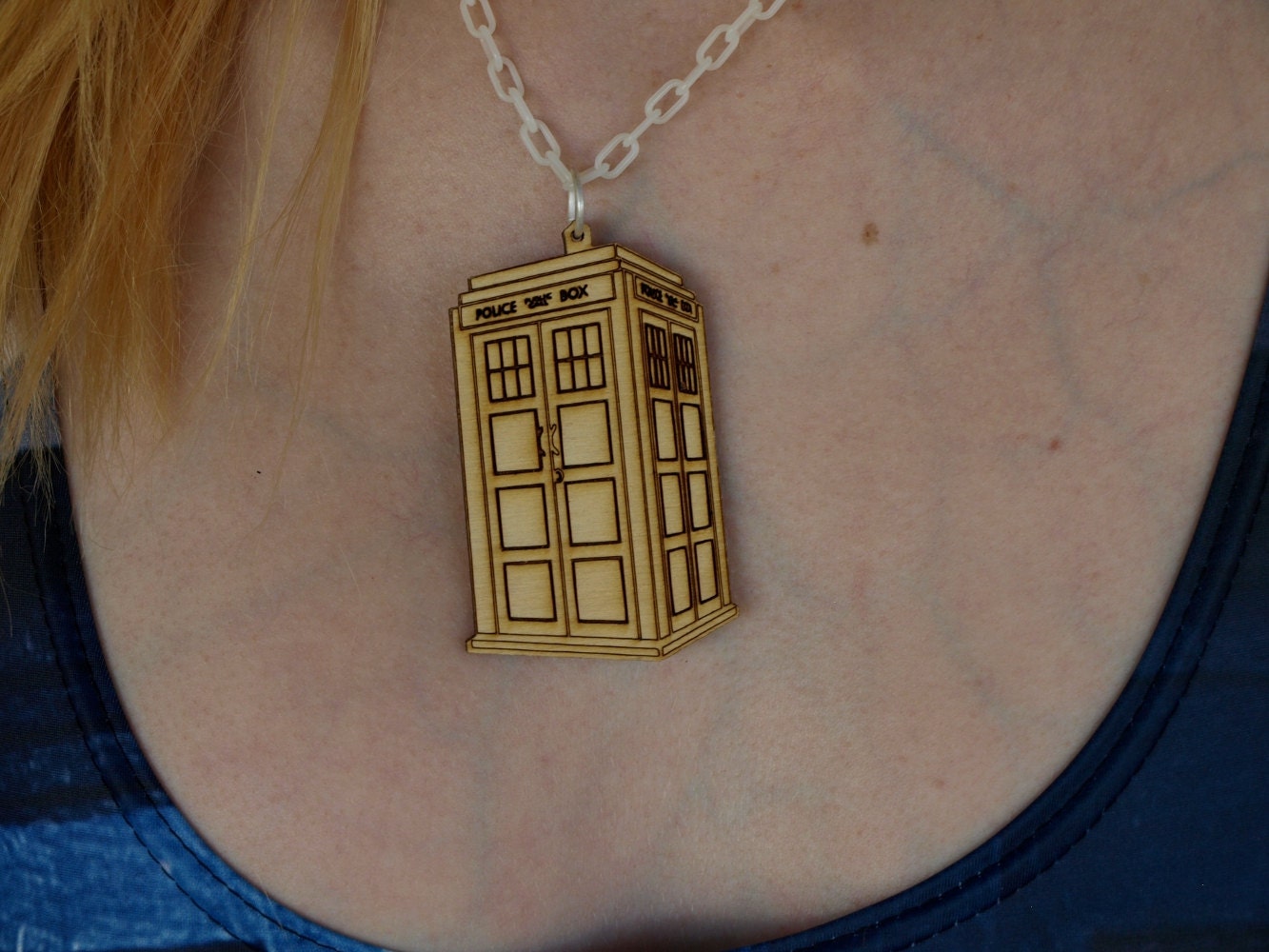 Wooden TARDIS necklace.