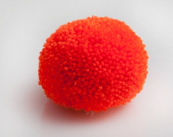 handmade brooch with a big orange pompom fluorescent neon, pom pom, pompon by bimabejbe