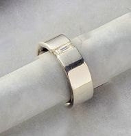 Sterling Ergonomic Ring with an Implanted clear CZ.