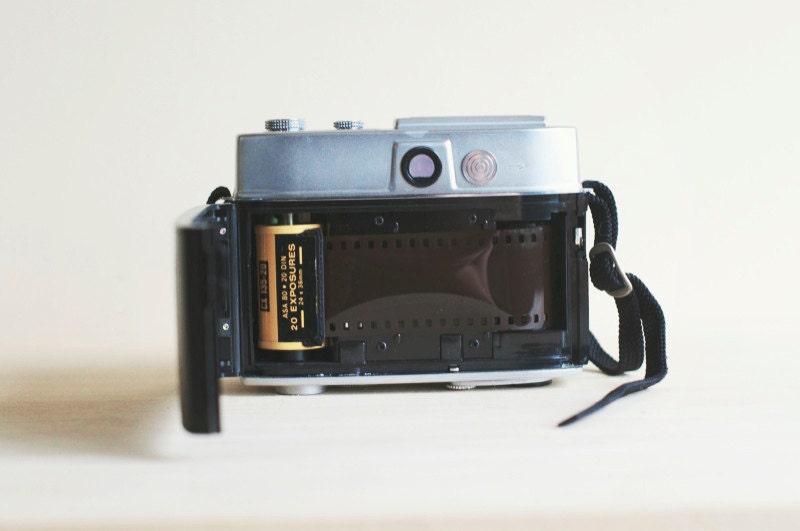 vintage 35mm film camera with beautiful leather case. kodak automatic 35f.