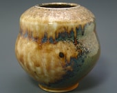 Vase, woodfired porcelain with secret shino and natural ash glazes