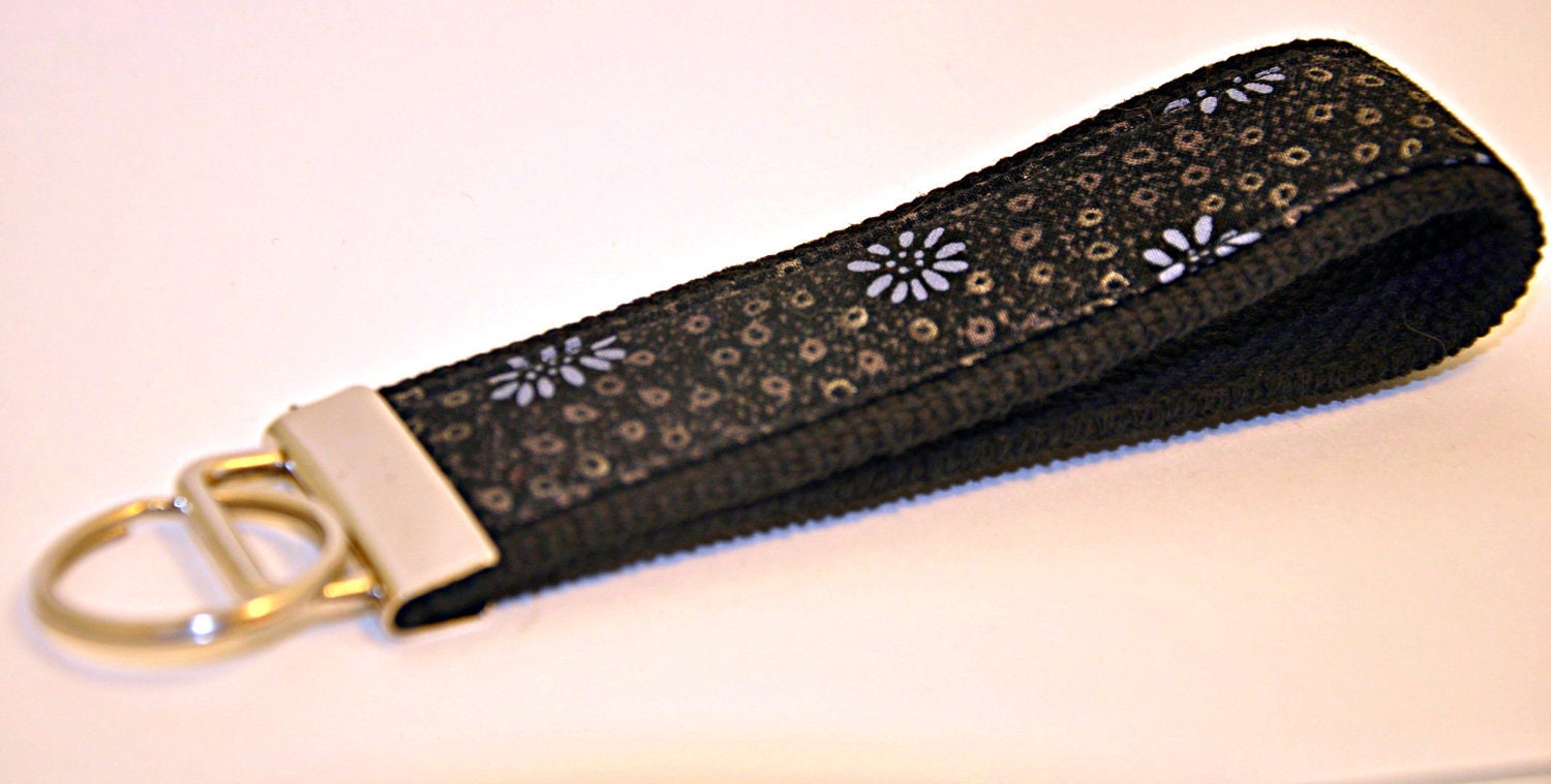 Steel Gray Daisies with Darker Gray Small Circles on a black Background Fabric Wristlet Keychain