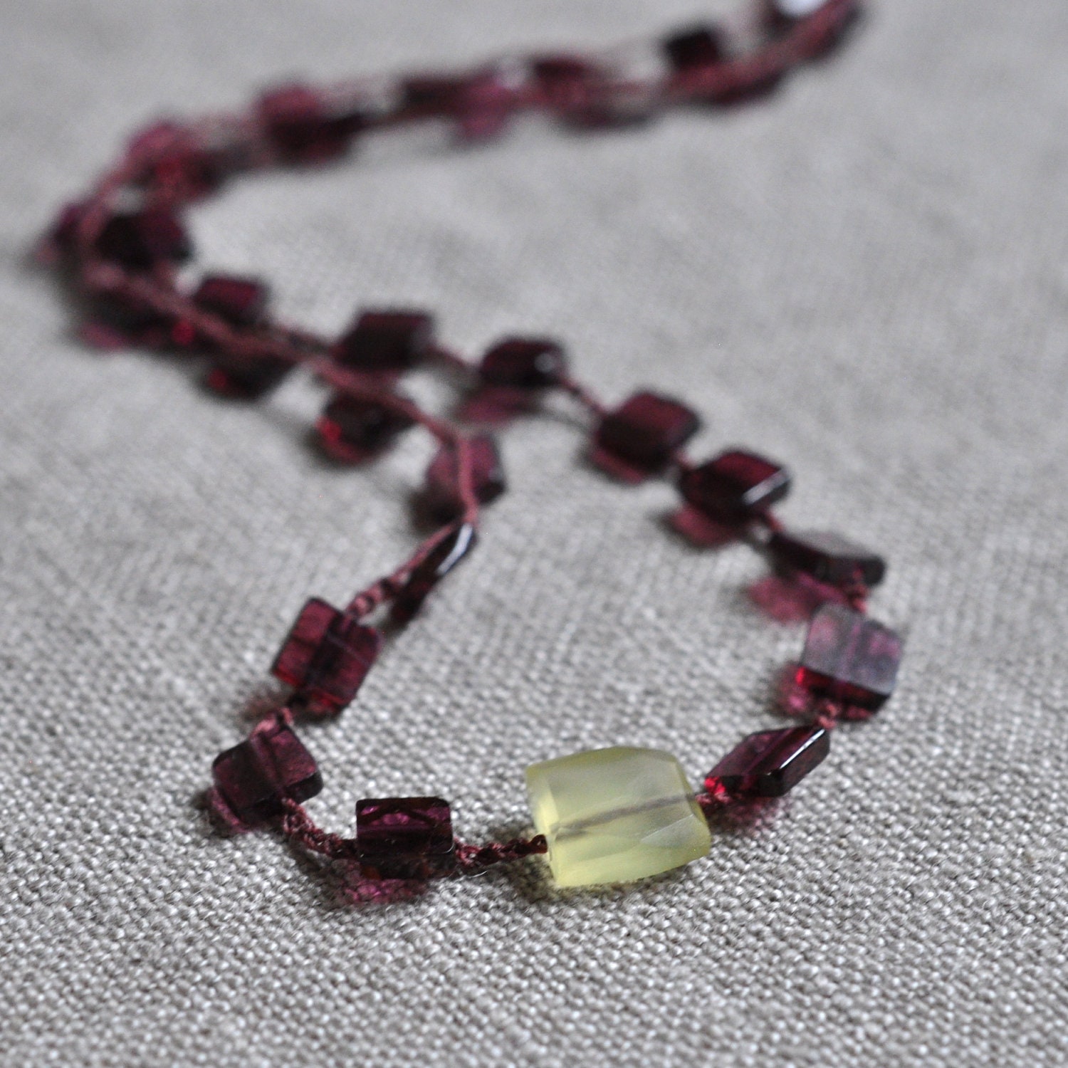 Garnet and Agate crocheted gemstone necklace: flat cut garnet squares with green agate focal