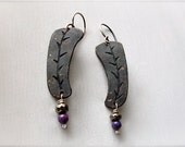 carved leaf earrings : tribal, botanical jewelry . bronze with dark patina, pyrite, and bronze infused purple turquoise