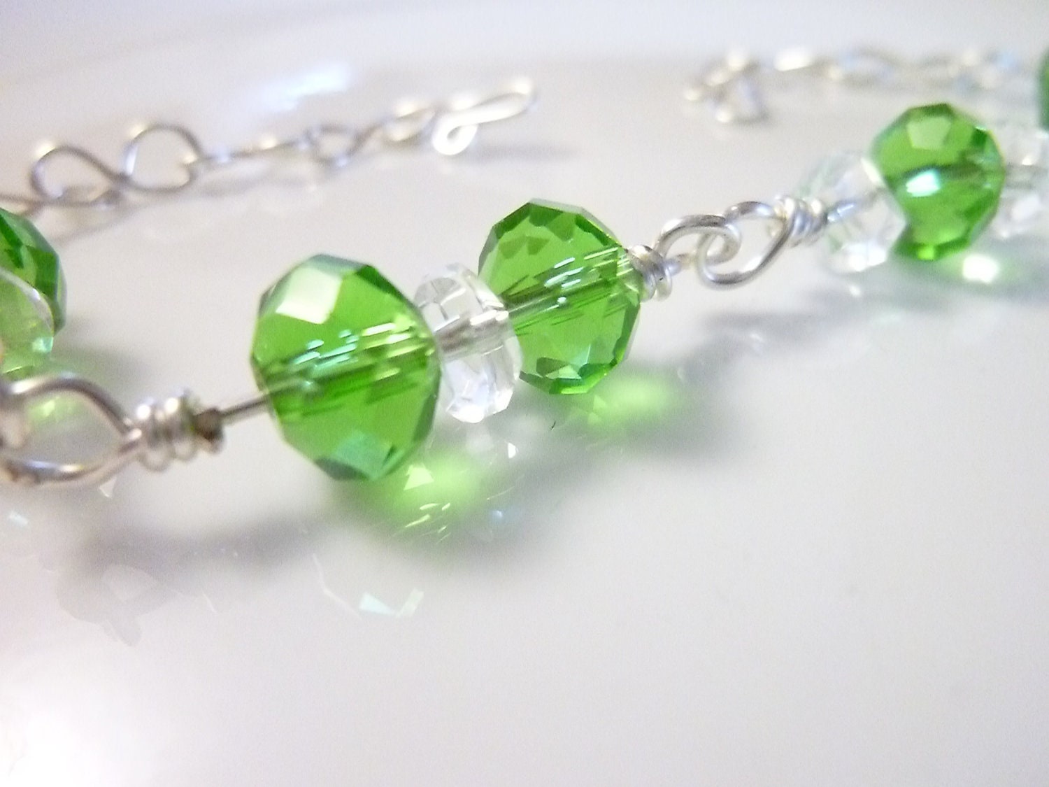 Green Machine -- Hand Wire Wrapped silver Bracelet with Green and Clear Crystals