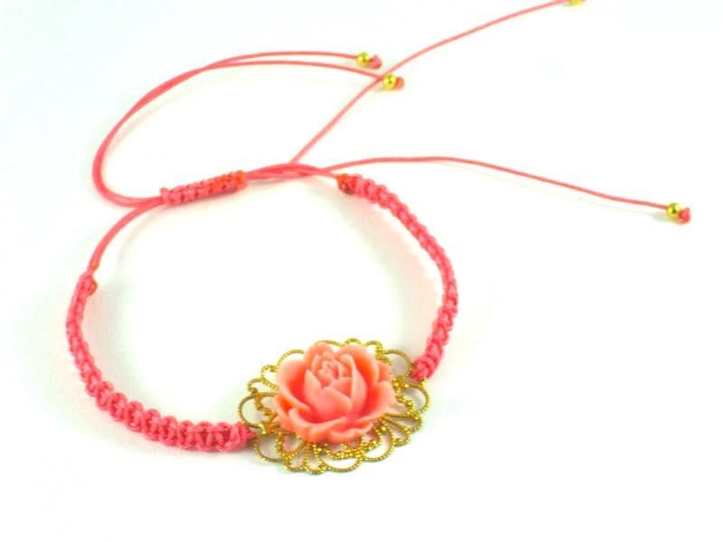 Pink  gold gilded bracelet with  resin blossom and gold gilded beads