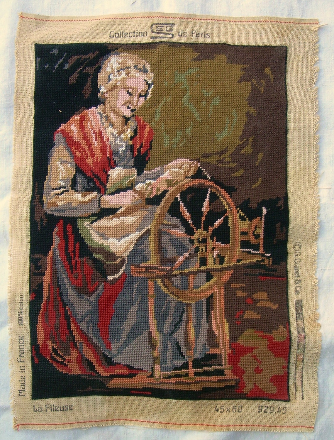 needlepoint tapestry wall hanging vintage, the spinning woman, spin wheel, past centuries clothes