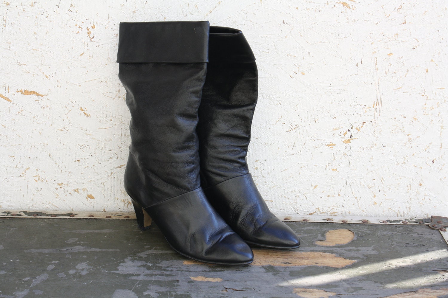 1980s Black leather boots. Modern, hip, high fashion Fold over Pirate boots with heels. Calf Height Size 8M
