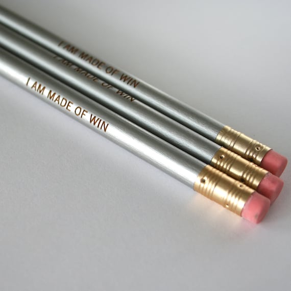I am made of win. 3 three silver Self congratulatory pencils make writing and test taking fun again. halloween treats that won't rot teeth.