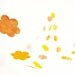 Yellow garland with paper flowers