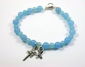 End Child Abuse Awareness Pinwheel Light Blue Bracelet