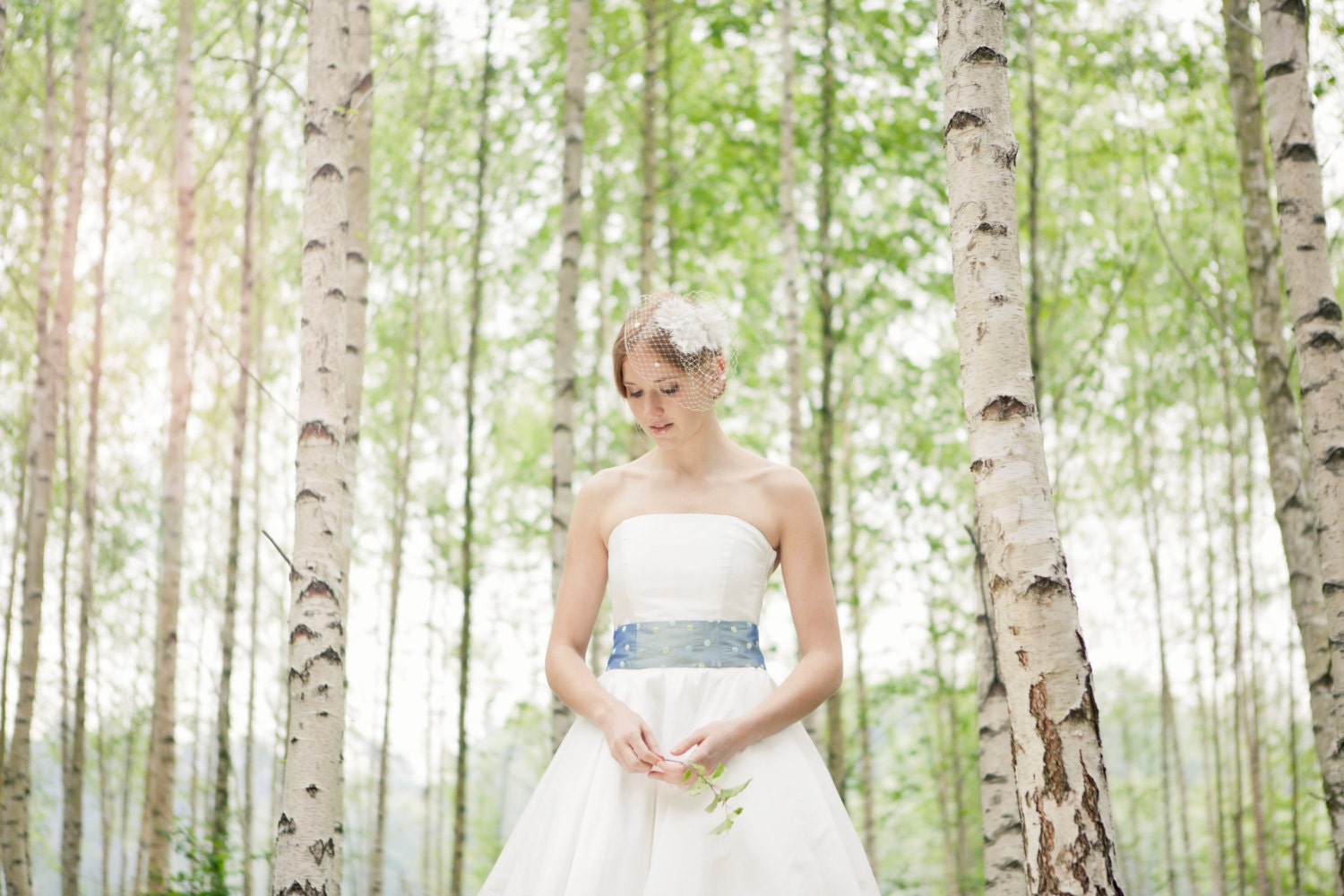 Flora - strapless tea length rockabilly weddingdress with petticoat and a sea green belt with colorful dots, made of pure silk, by noni