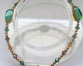 Heart Toggle Bracelet with Brown and Green Glass Beads, Gold Plated Beads and Swarovski Crystals