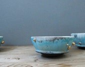 Turquoise blue monk bowl with gold inclusions