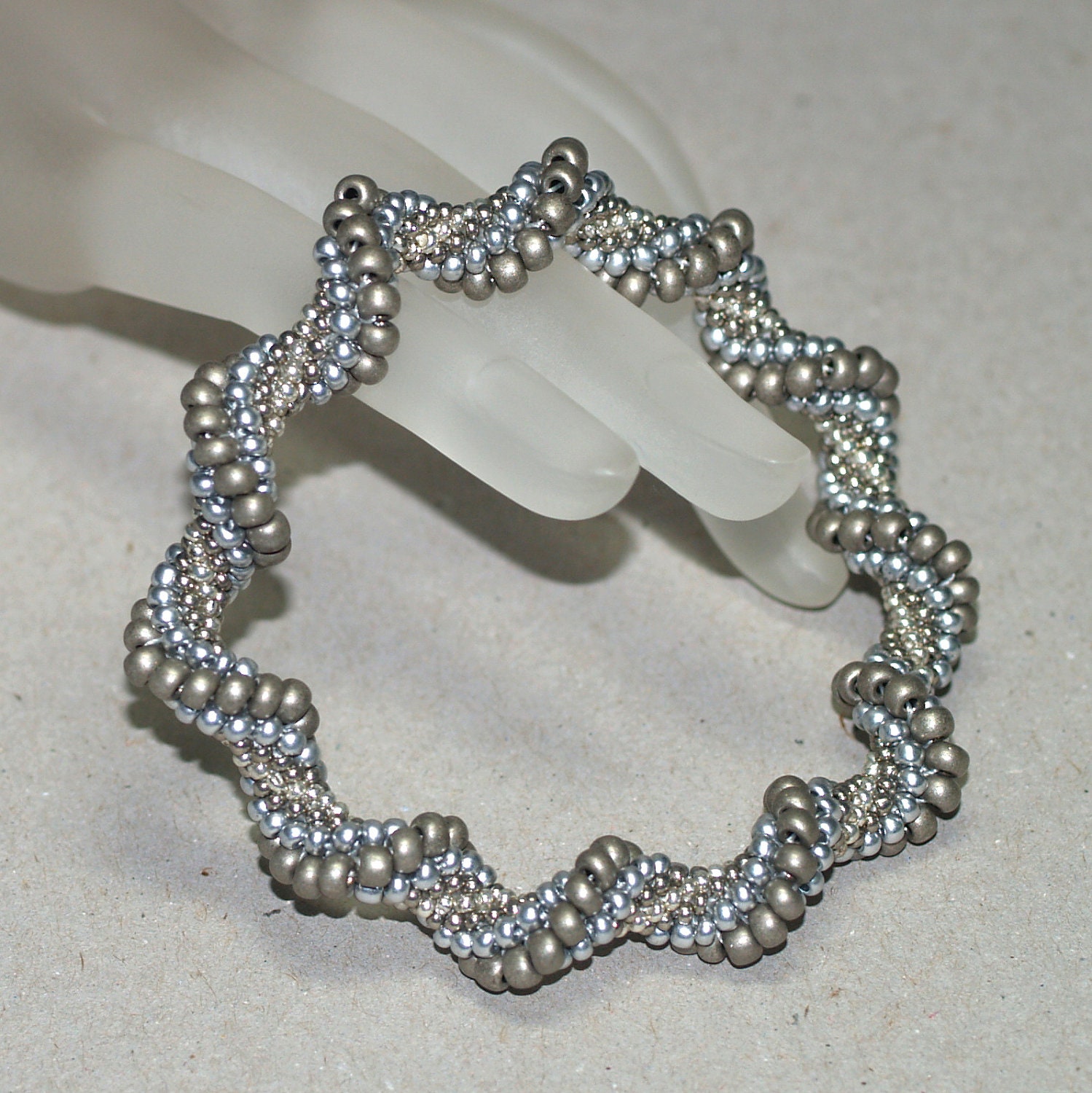 Silvery Twist ... Bracelet . Bangle . Matte Silver . Shiny . Pewter . Stainless Steel . Shiny . Bead Crochet . Spirals . Elegant