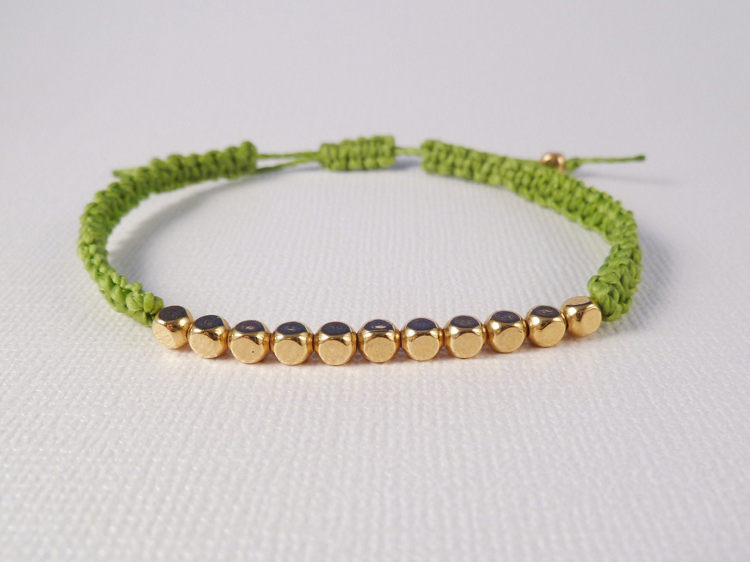 Stacking bracelet, Gold plated brass beads on spring green cord, Macrame bracelet, Modern Friendship bracelet