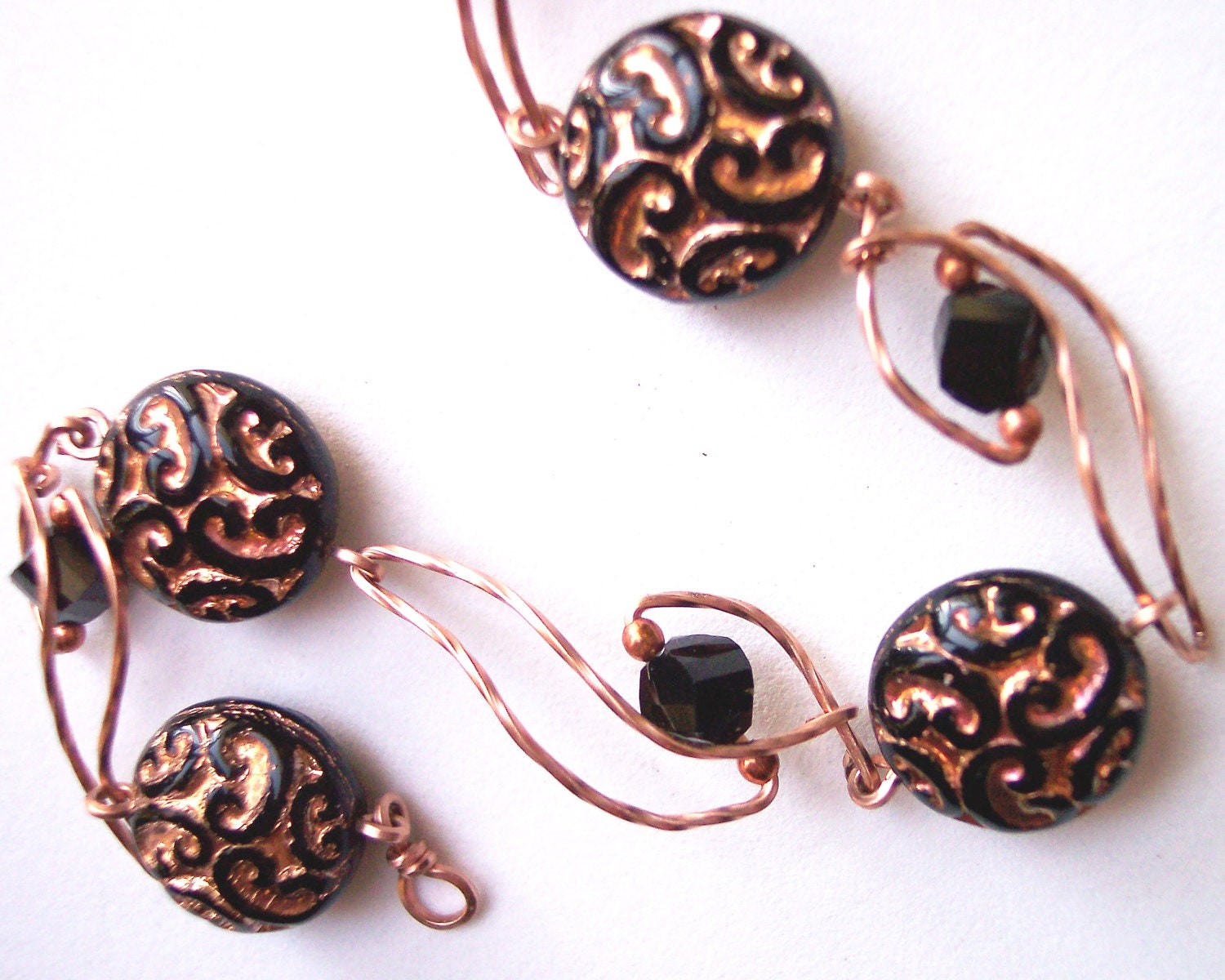 Copper Curlicues Bracelet with 14Karat Rose Gold Filled Wire Spirals and Spiral Cut Jet Black Swarovski Crystal