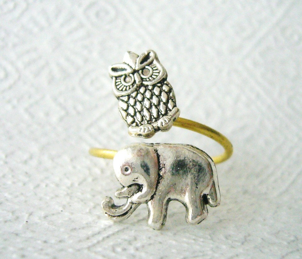 Silver owl ring with an elephant