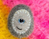 TINY tiny little one eyed cyclops pebble alien monster guy in recycled baby alpaca wool sweater