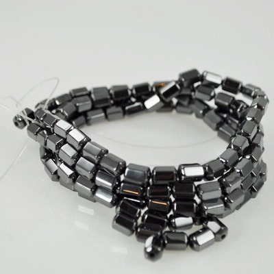 82 Magnetized Hematite Beads - Octagon Shaped Barrel