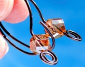 GIGI. champagne or topaz rose glass with oxidized copper wire earrings