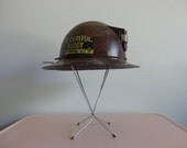 be careful buddy...VINTAGE miner's hard HAT